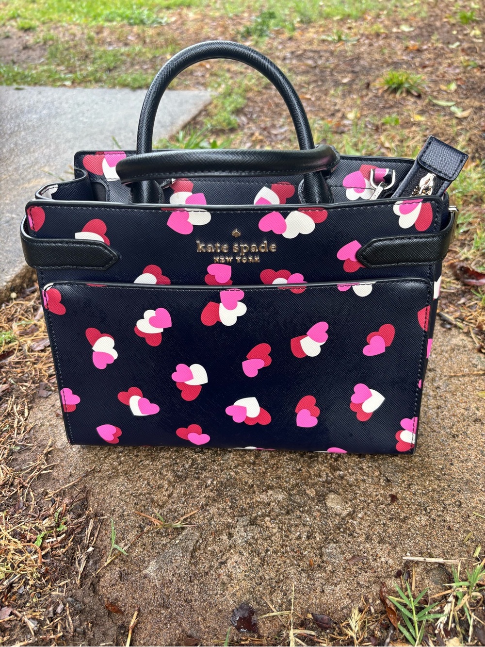 kate spade black satchel with pink, red and white heart print